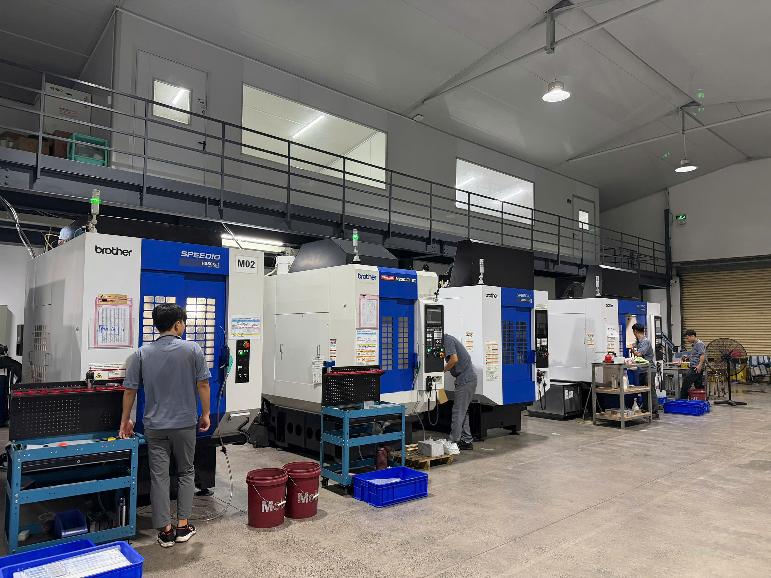 Row of Brother SPEEDIO machining centres